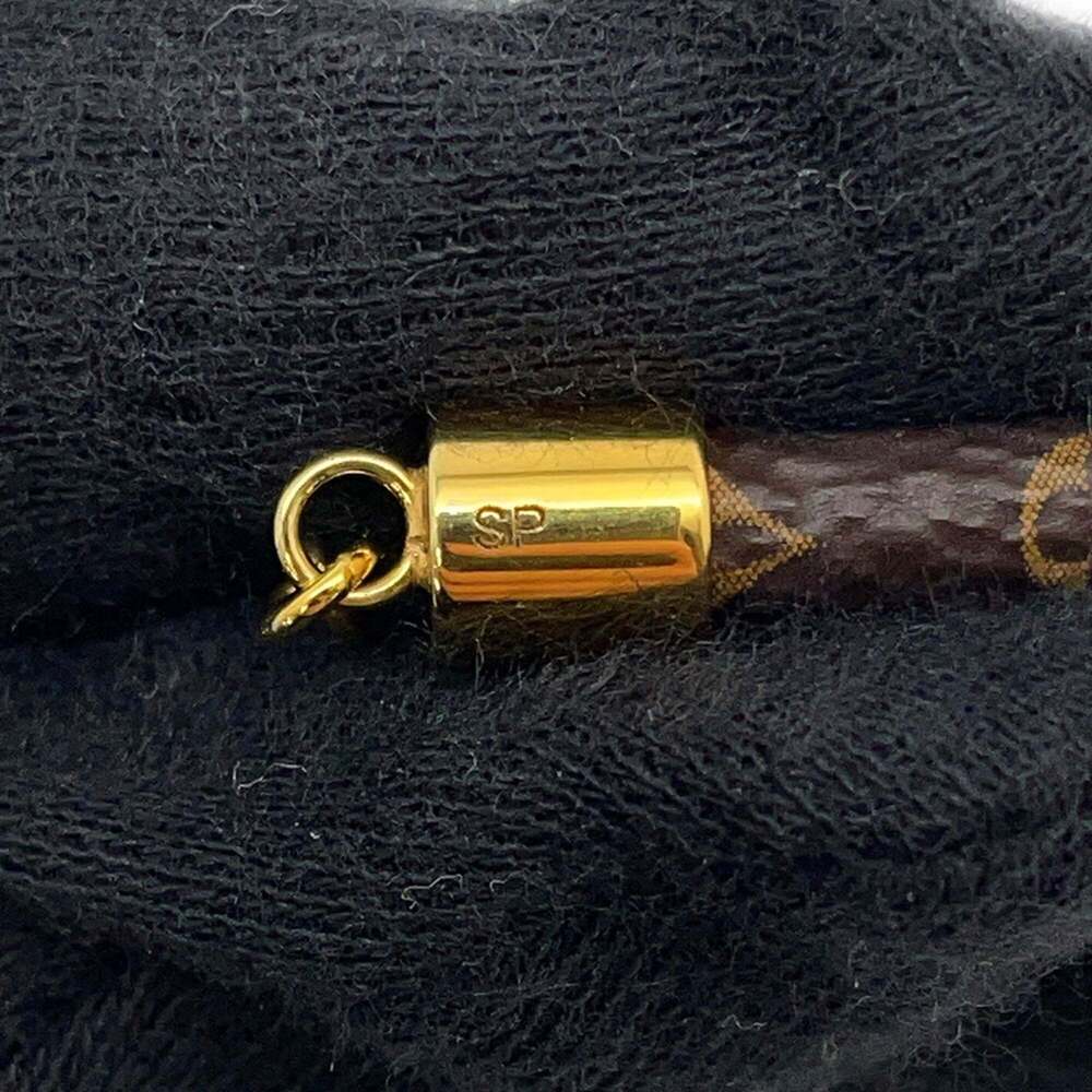 LOUIS VUITTON Brown Monogram Charm Bracelet - Picture 9 of 10